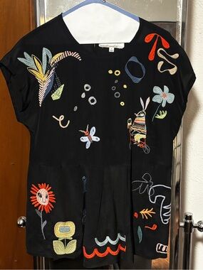 Biya Black Embroidered Silk Short Sleeve Tunic Top with Colorful Motifs.